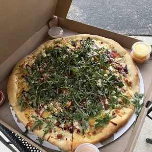 Speciality peachy pig pizza