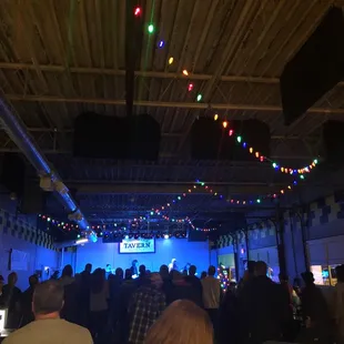 a crowd of people at a party