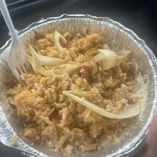 This much of the plate was just rice. And big onions