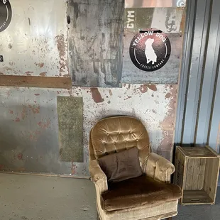 a brown chair and a clock
