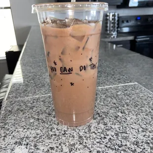 a cold beverage in a plastic cup