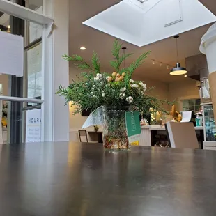 Love the floral arrangements on each table. :)