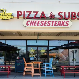 Yellow Submarine Pizza &amp; Subs &amp; Cheesesteaks Storefront with outdoor seating at the Outer Banks Mall in Nags Head, North Caro...
