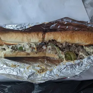 12&quot; Philly cheesesteak with mushroom and onions.