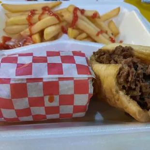 Philly cheesesteak with onions and mushrooms.