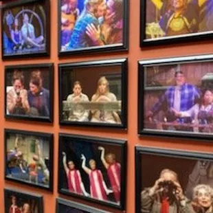 photographs on the wall in the lounge