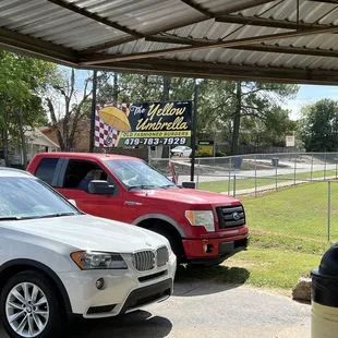 two cars parked in a parking lot