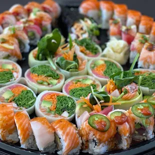 a platter of sushi rolls