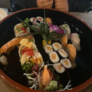 Lobster roll, salmon nigiri, yellow tail nigiri, salmon tekka maki, tuna tekka maki