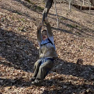 Swinging like a monkey.