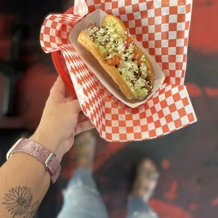 a hot dog in a basket