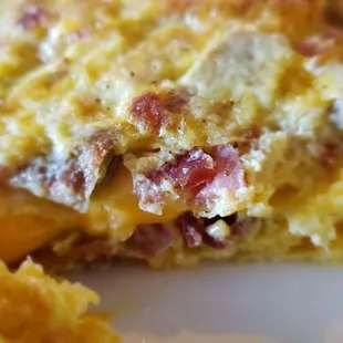 Ham, bacon, cheese and sausage omelette