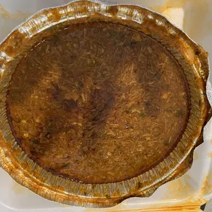 a pie in a styrofoam container