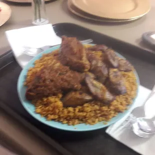 Fried Tilapia, jollof rice