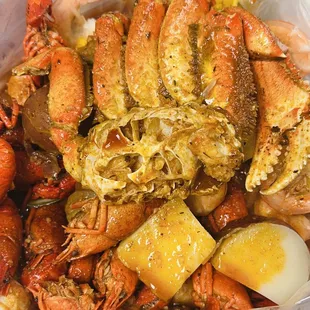 a plastic container filled with seafood