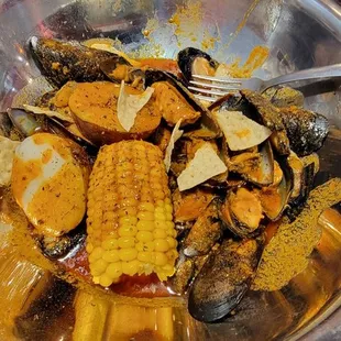 Black mussels with house special sauce.