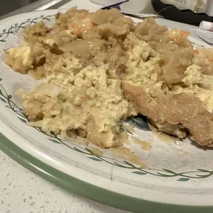 Egg Foo Young on my plate and inside my container at home for inspection.