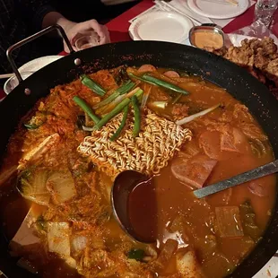 Budae Jjigae. Will need extra ramen and ddukbokki to get most of that soup.