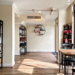 a dining room with a table and chairs