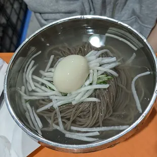 Nangmyun. Cold noodle dish in their "special" chilled broth. Is it Donchimi broth?