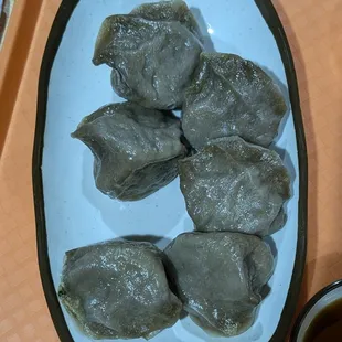 Steamed Mandu. The color isn't the usual golden colored dumplings you'll find at other places, because it's made out of buckwheat flour.