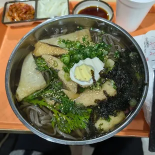 Udon. It looks kind of plain at first glance. But, the broth is out of this world. My husband stole my chrysanthemum greens.