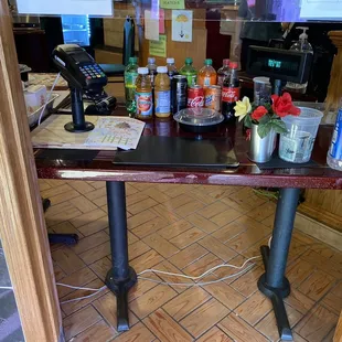 a view of the counter area of a restaurant