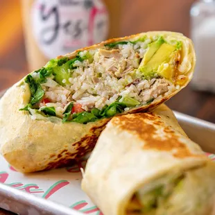 YES! Burrito - Chicken, rice, avocado, lettuce, sweet plantain, mozzarella, pico de gallo &amp; homemade alioli in a grilled tortilla.