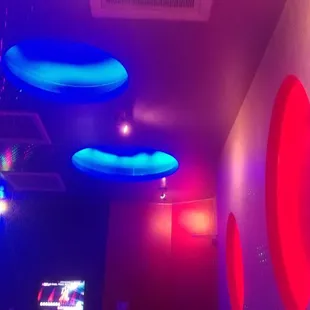 a room with blue and red lights