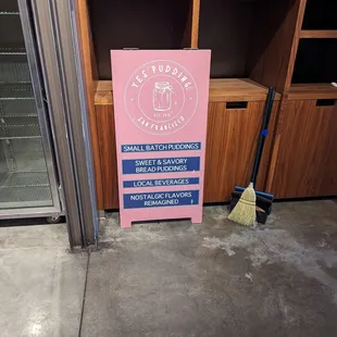 a sign in front of a store