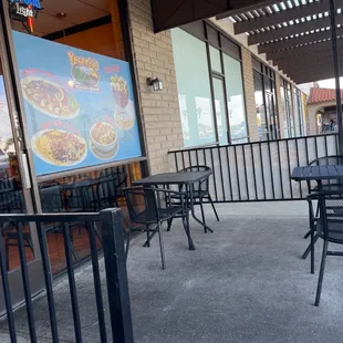 tables and chairs outside a restaurant