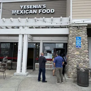 Outside of the restaurant. It was lunchtime... The line was spilling outside, but moved fast.