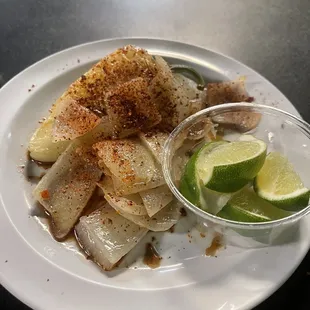Seasoned Onions &amp; Yellow Peppers with limes to compliment your sushi