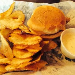 Grilled chicken sandwich w/ cheese and a side of homemade potato chips