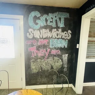 a chalkboard with a message