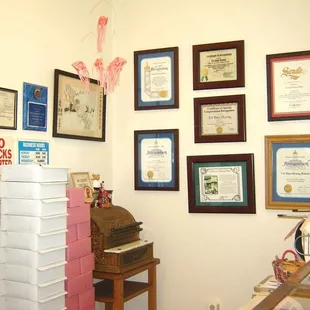 Certificates of appreciation and recognition praising Bakery for their longevity.