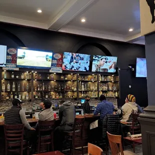 people sitting at the bar