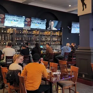 people sitting at the bar