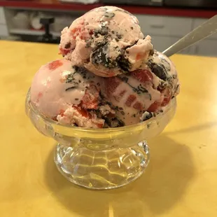 One scoop of amaretto cherry ice cream
