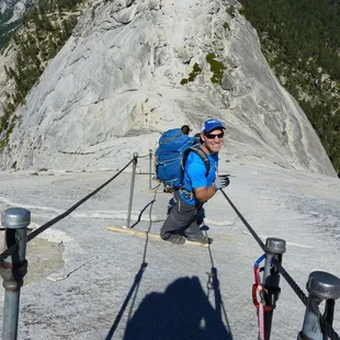 John shoots me a grin while we're stuck on the cables. Stay positive!