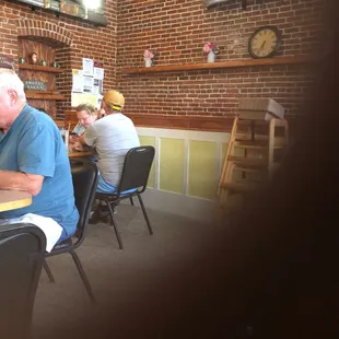 a group of people sitting at a table