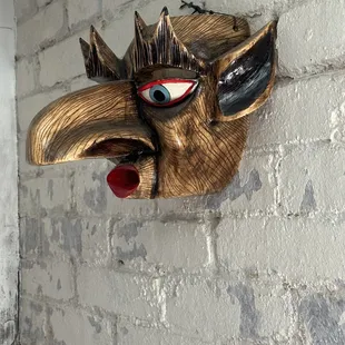 a mask on a wall