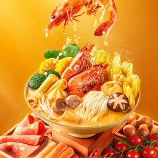 a bowl of noodles with shrimp and vegetables