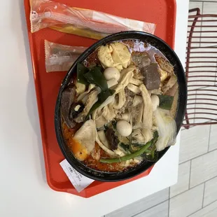 A combination of most ingredients that they carried, cooked in a spicy beef bone soup