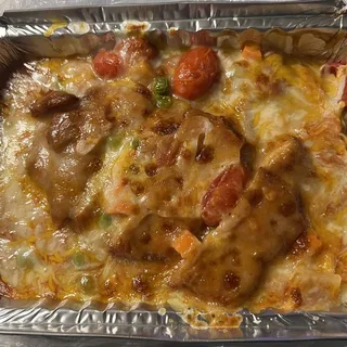 B01. Baked Pork chop with Tomato Sauce and Cheese on Rice