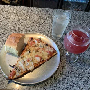 A slice along with a Blueberry Sour for lunch