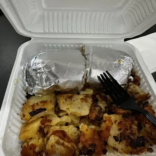 Breakfast burrito and potatoes