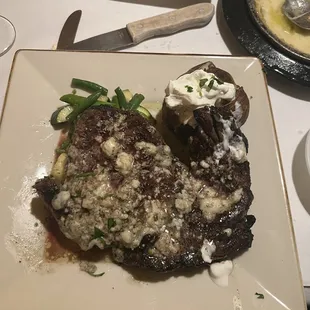 Ribeye steak with blue cheese crumbles