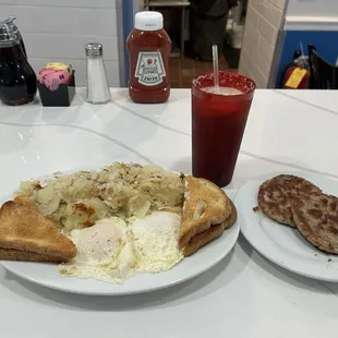 Two eggs over easy, toast, mound of home fries,  sausage patty's, cold brew coffee. All for 12$
