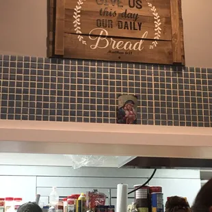a sign above the counter